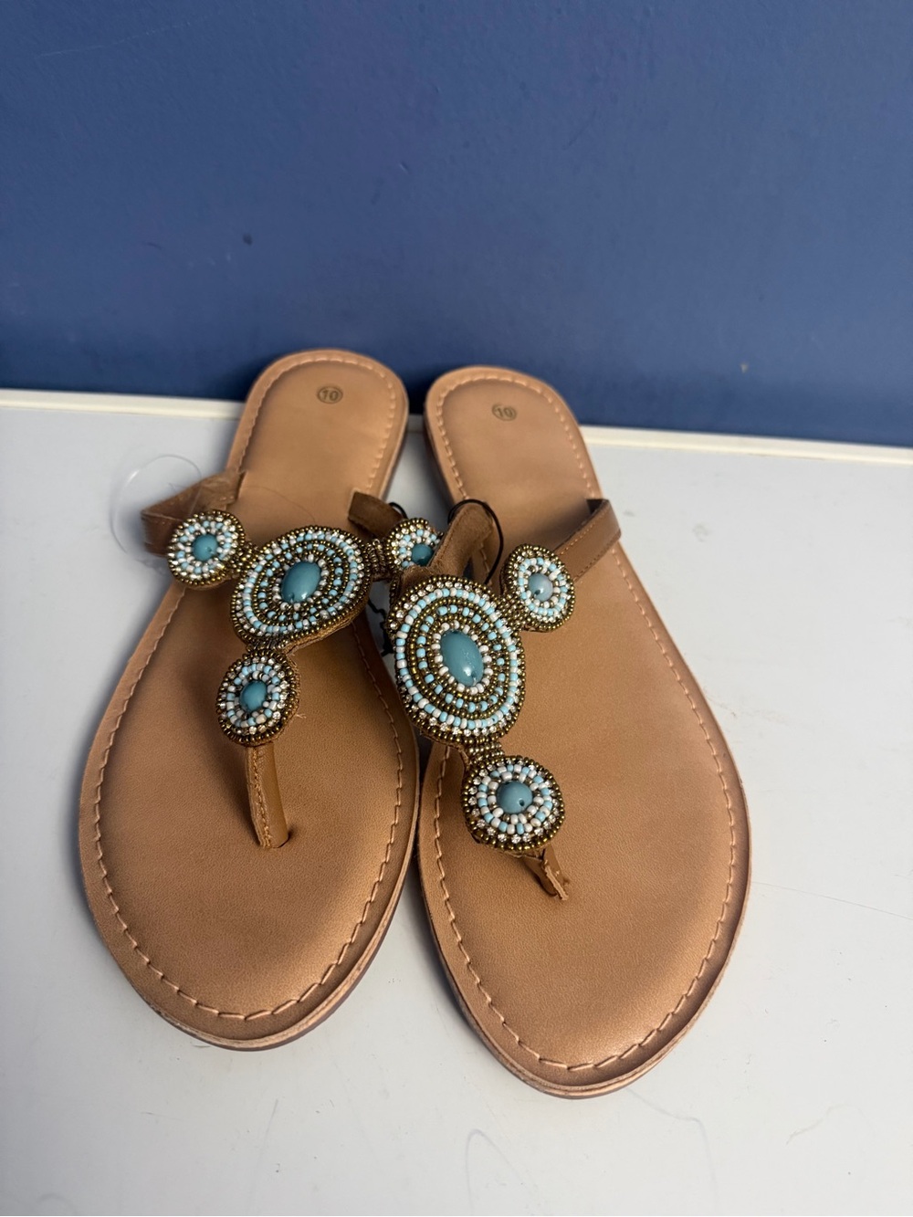 Beaded Tan Leatherette Toe-Post Sandals with Turquoise Accents - Picture 1 of 3